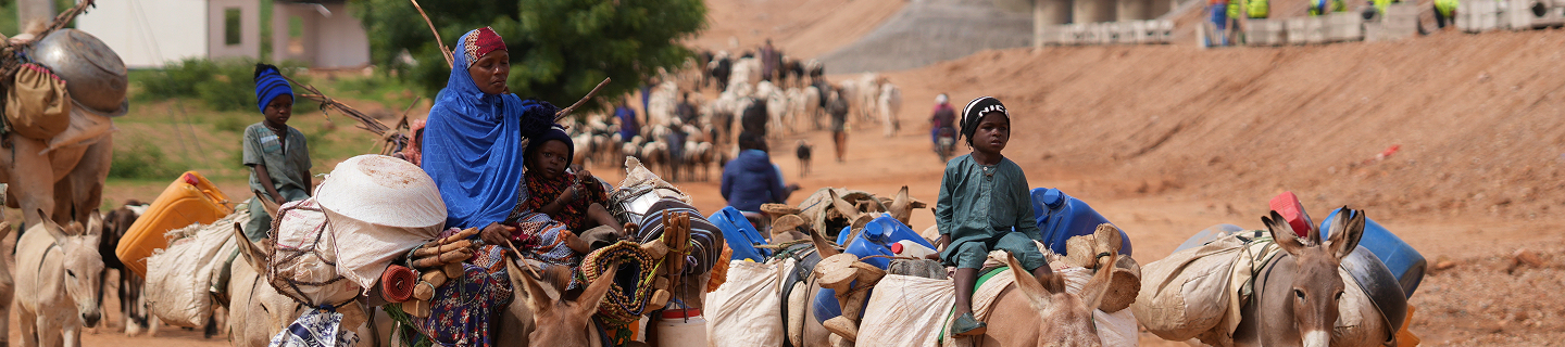 Local community transportation near Mota-Engil project site in Nigeria - desktop view.